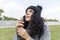 Portrait of a beautiful girl with dandelion flower