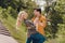 Portrait of beautiful handsome adorable cheerful spouses dancing spending enjoying weekend sunny day outdoors