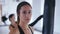 Portrait of beautiful kickboxing woman tired after training in the gym. Attractive sportswoman after training in fitness