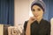 Portrait of a beautiful muslim woman at a table in a cafe