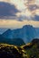 Portrait beautiful scenic mountain background with blue sky, cloud and blast horizon sun