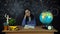 Portrait of a beautiful schoolgirl student , thinking about choosing a profession, on the background of a black Board