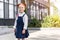 portrait of beautiful small red haired schoolgirl