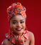 Portrait of beautiful smiling nigerian woman in traditional outfit