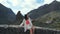 Portrait of a beautiful tourist woman in the Masca valley on the Canary island of Tenerife. The girl enjoys the