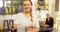 Portrait of beautiful waitress standing with napkin 4k