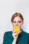Portrait of beautiful woman with orange in her hand. Copy space. Health, nutrition, beauty,