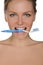 Portrait beautiful woman with toothbrush in teeth
