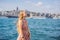 Portrait of beautiful woman tourist with view of Galata tower in Beyoglu, Istanbul, Turkey. Turkiye