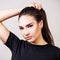 Portrait of beautiful woman with vitiligo in black t-shirt.