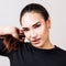 Portrait of beautiful woman with vitiligo in black t-shirt.