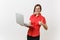 Portrait of beautiful young business teacher woman user in red shirt, glasses working typing on laptop pc computer