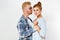 Portrait of a beautiful young happy smiling elegant couple - isolated mock up, background people.B eautiful young happy couple