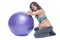 Portrait of a beautiful young pregnant woman exercises with fitball. Working out and fitness, pregnancy concept