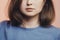 Portrait of a beautiful young woman on studio background, bottom part face with lips of girl with natural beauty, concept people