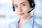Portrait of beautifull business woman in headset. Call center operator