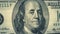 Portrait Benjamin Franklin on USA money One hundred dollars banknote pile