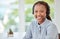 Portrait of a black customer support consultant, receptionist or call center agent with a headset. Happy, expert and