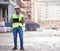Portrait of black man engineer, tablet and construction site with mockup space in city, planning and safety. Smile