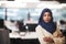 Portrait of black muslim female software developer