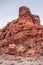 Portrait, blackened red rock peak, Valley of Fire, Nevada, USA