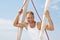 Portrait of blond handsome young man on sailing boat.