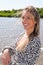 Portrait of blonde beautiful woman at vacation day beach smile and happy in summer