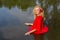 Portrait blonde dutch woman standing in water
