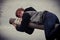 Portrait of a Boy Clinging to a Rusty Pole