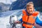 Portrait of boy close up driving the motorboat, Norway. He is enjoying the moment.