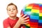 Portrait of boy with colorful inflatable ball