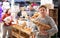 Portrait of a boy with dog in petshop