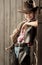 Portrait of a boy dressed as a cowboy