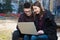 Portrait of boy and girl high school teenager students with laptop