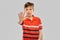 Portrait of boy making stopping gesture