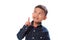 Portrait of boy pointing finger up on white background