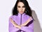 Portrait of brunette woman with in lilac, purple clothes, jacket holding hands crossed gesturing No way, Enough, Stop