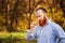 Portrait of brutal man in shirt with red hair and beard