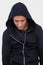 Portrait of a burglar in hood jacket