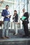 Portrait of business executives standing on stairs outside platform