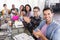 Portrait of business team clapping while sitting at creative office