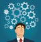 Portrait of businessman with gears icon background