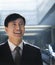 Portrait of businessman looking up in a parking garage