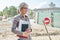 Portrait of businesswoman on construction site repairing road