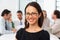 Portrait Of Businesswoman Sitting At Boardroom Table