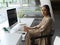 Portrait of businesswoman take a break with a cup of beverage while sitting at working table