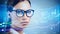 Portrait of businesswoman, trader or financial analyst wearing glasses and looking straight toward the camera. Double exposure.