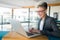 Portrait of businesswoman working on computer in office