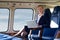 Portrait Of Businesswoman Working On Laptop In Helicopter Cabin