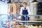 Portrait Of Butcher Standing Behind Counter